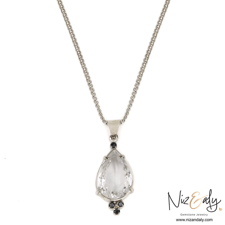 Faceted Drop Clear Quartz and Black Onyx  Pendant in 925 Silver.