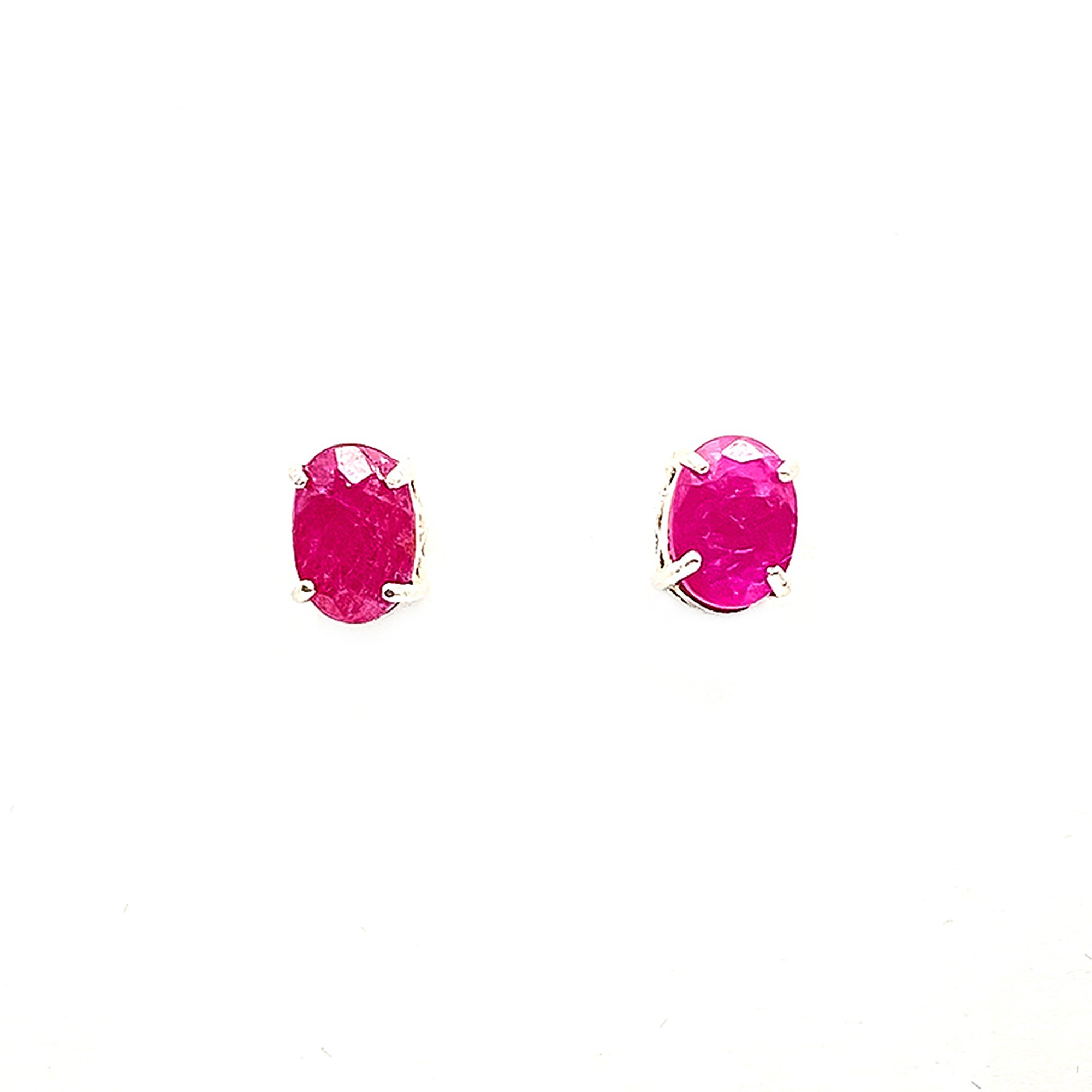 Oval Cut Ruby Stud Earrings