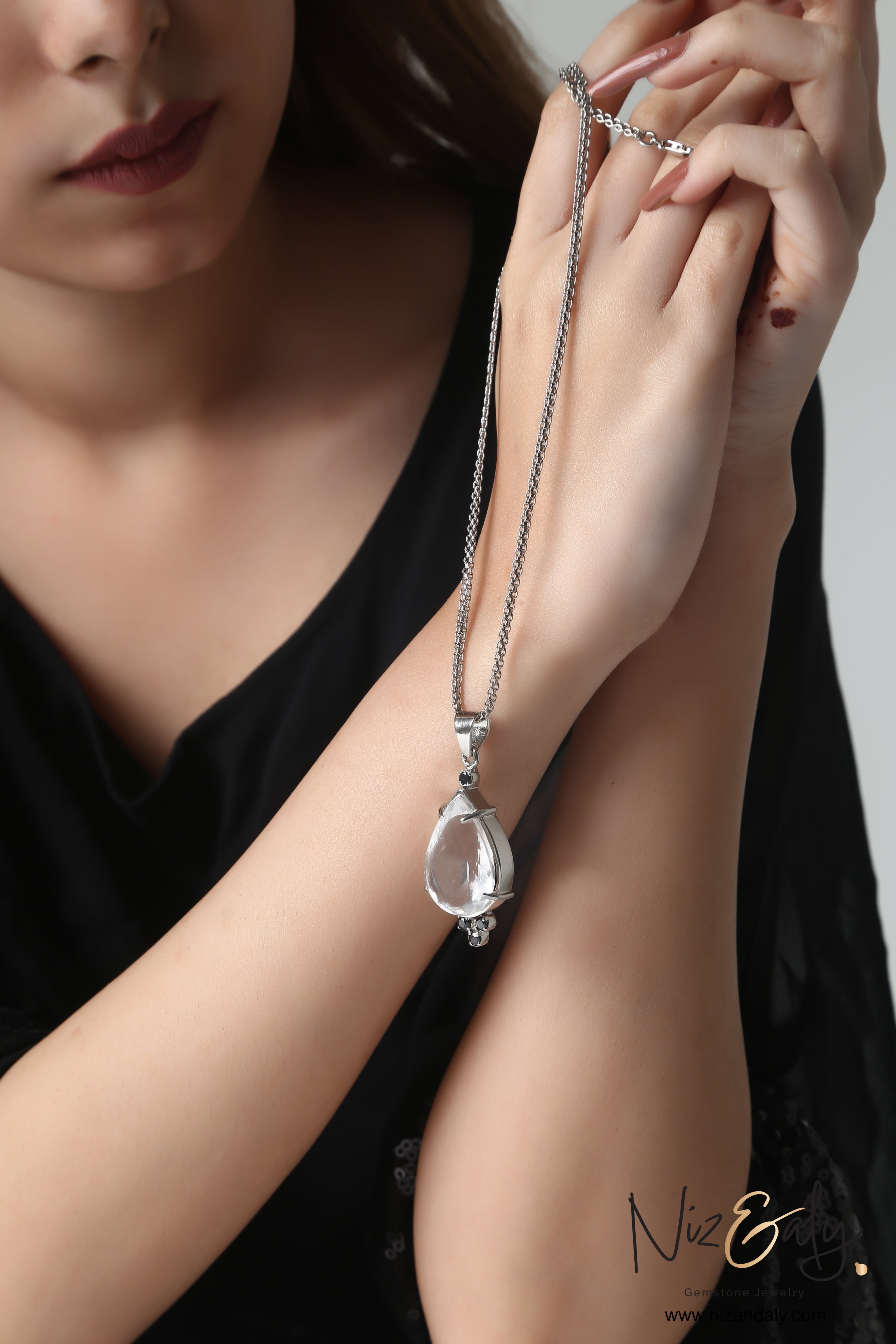 Faceted Drop Clear Quartz and Black Onyx  Pendant in 925 Silver.