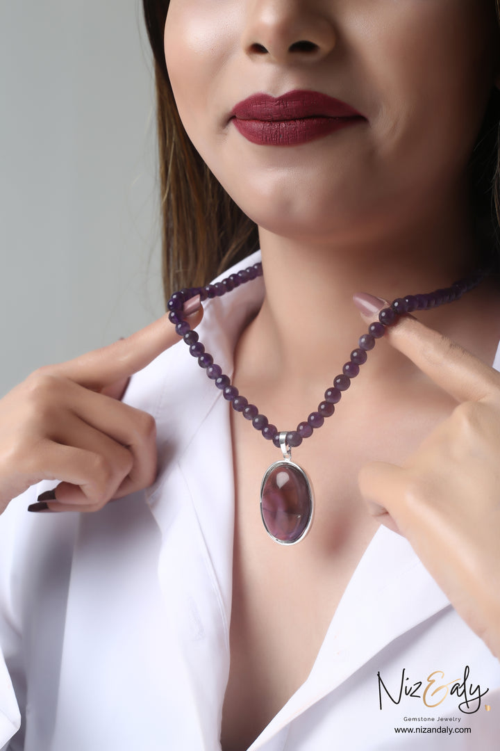 Amethyst Pendant in Amethyst String