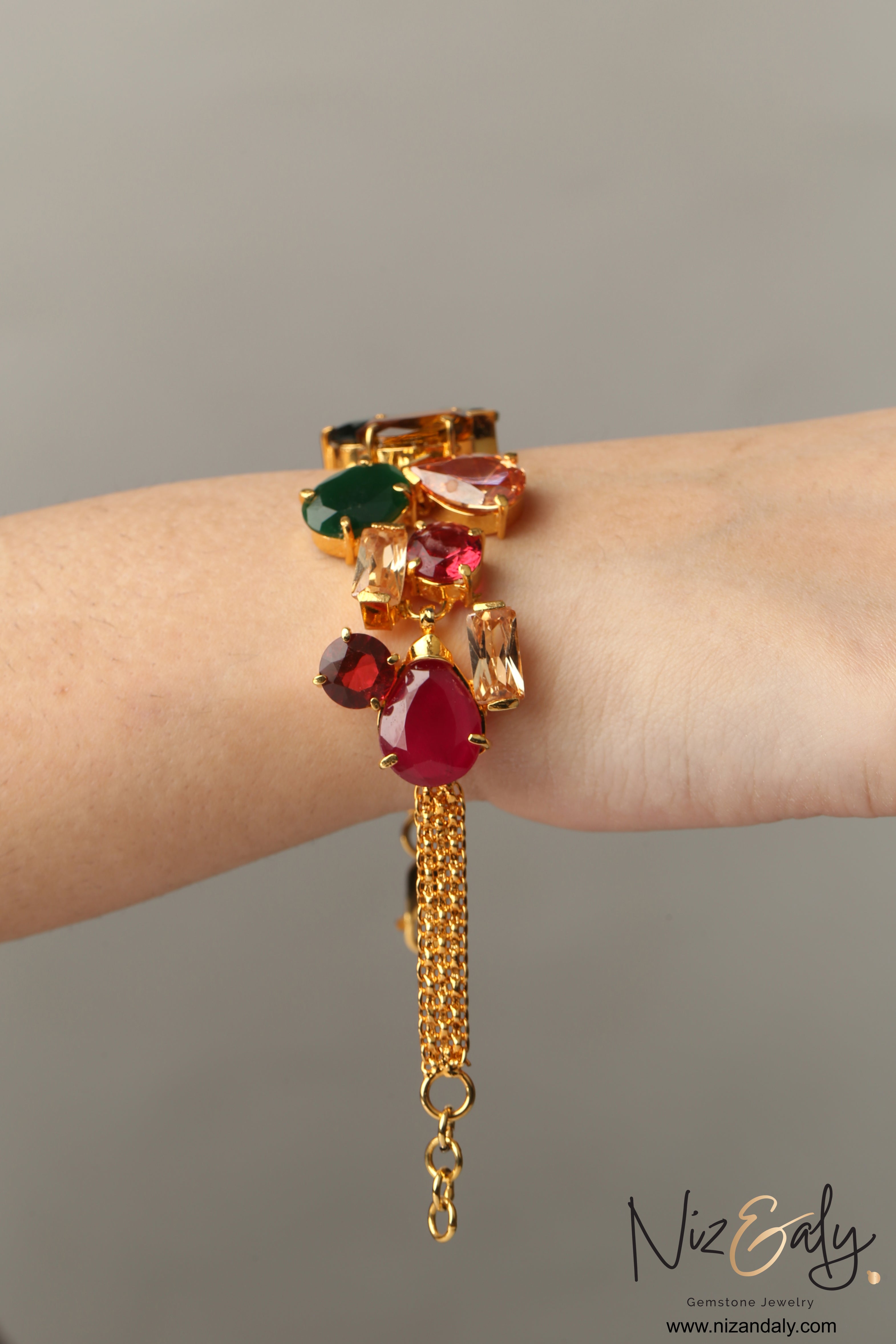 Luxury multicolor gemstone bracelet with gold chain detail