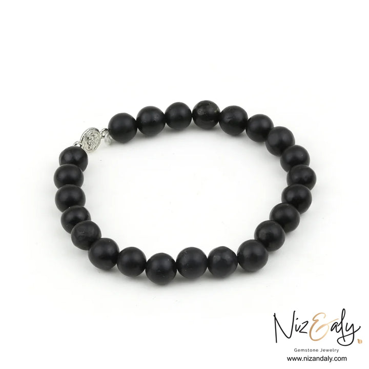 Genuine Shungite stretch bracelet with 925 sterling silver accent and comfortable 9-inch fit
