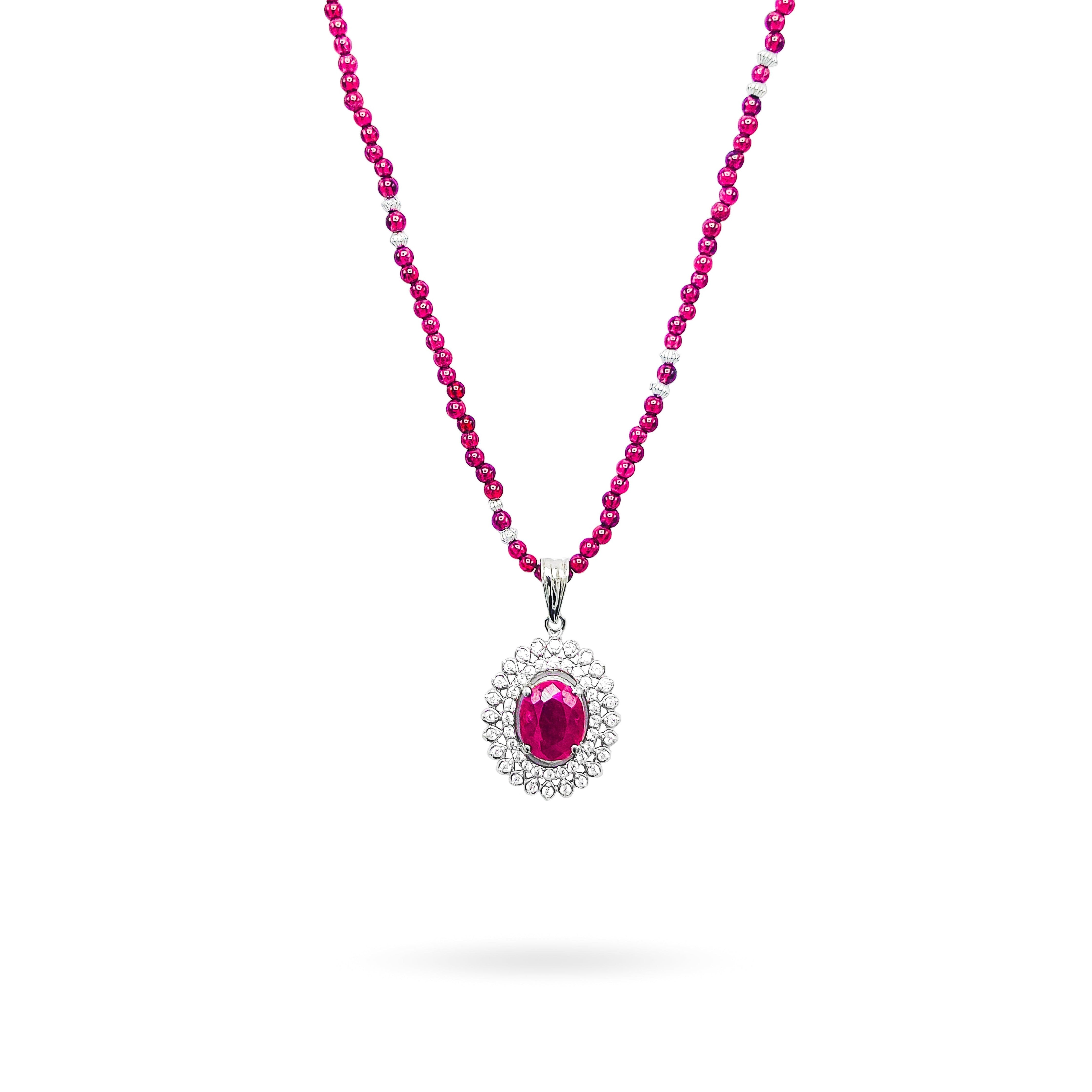 Niz & Aly African ruby pendant surrounded by diamonds on a vibrant red garnet beaded string necklace