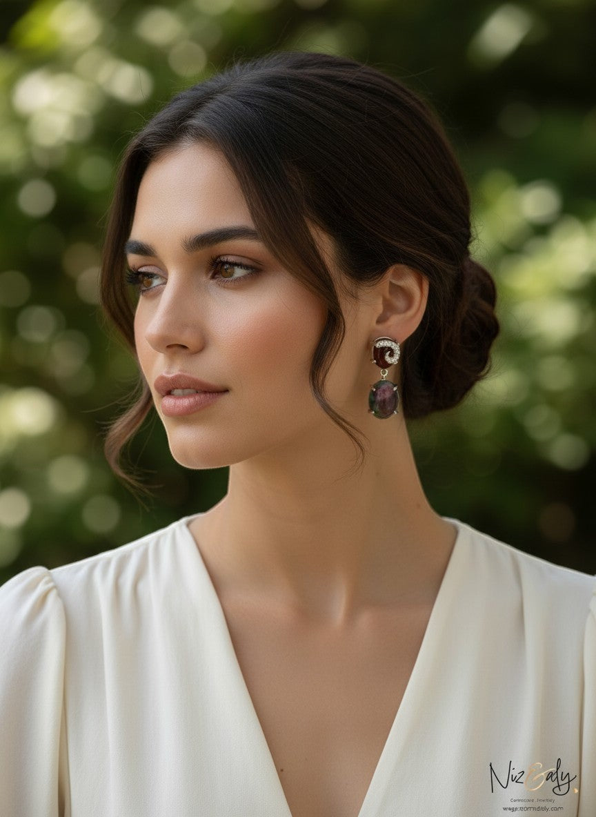 Niz & Aly Elegant Agate Ear Chandelier earrings featuring natural polished gemstones worn by a woman in a white dress.