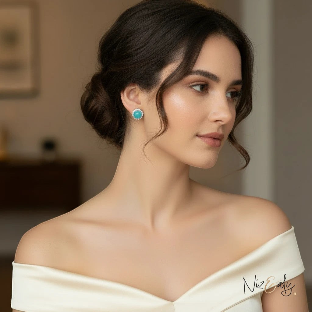 Niz & Aly amazonite stud earrings featuring a polished blue-green natural gemstone set in a delicate halo design.
