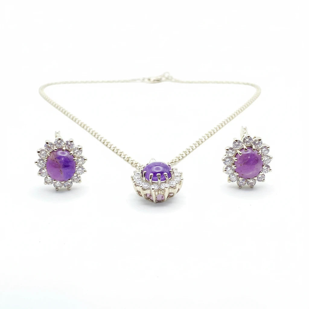Niz & Aly oval cabochon amethyst pendant and earring set with sparkling white stone halo accents on silver chains.