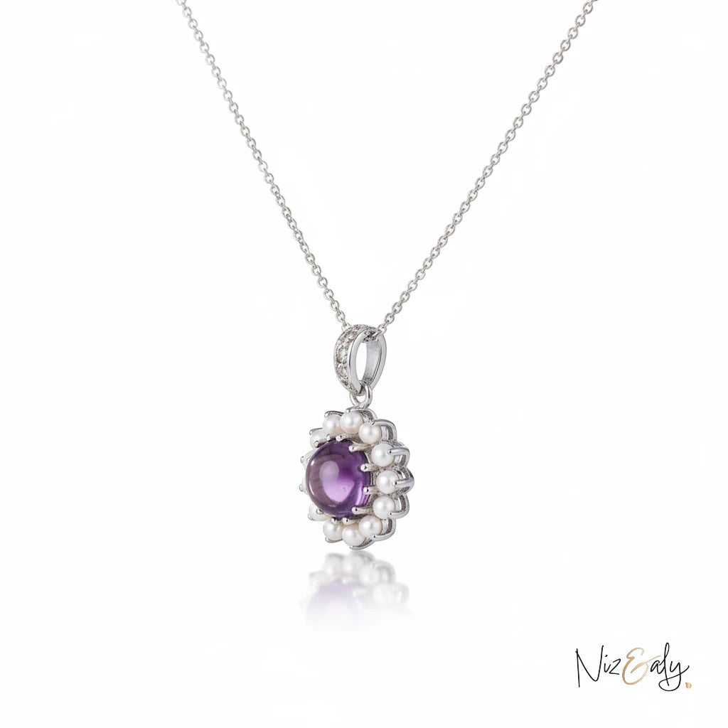Niz & Aly necklace featuring a round purple amethyst stone surrounded by small white freshwater pearls on a silver chain