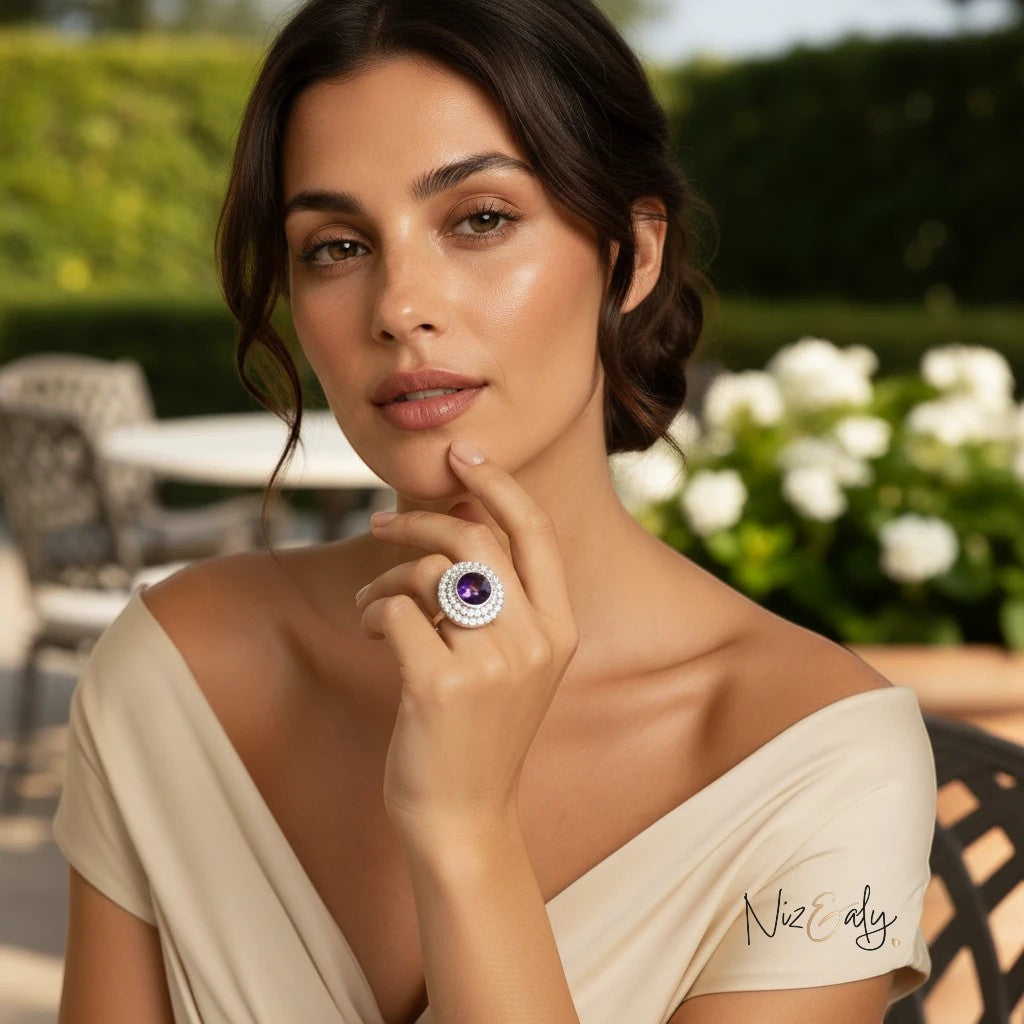 Niz & Aly Amethyst in Hemisphere Ring featuring a violet dome stone on a woman wearing an elegant off-shoulder dress.