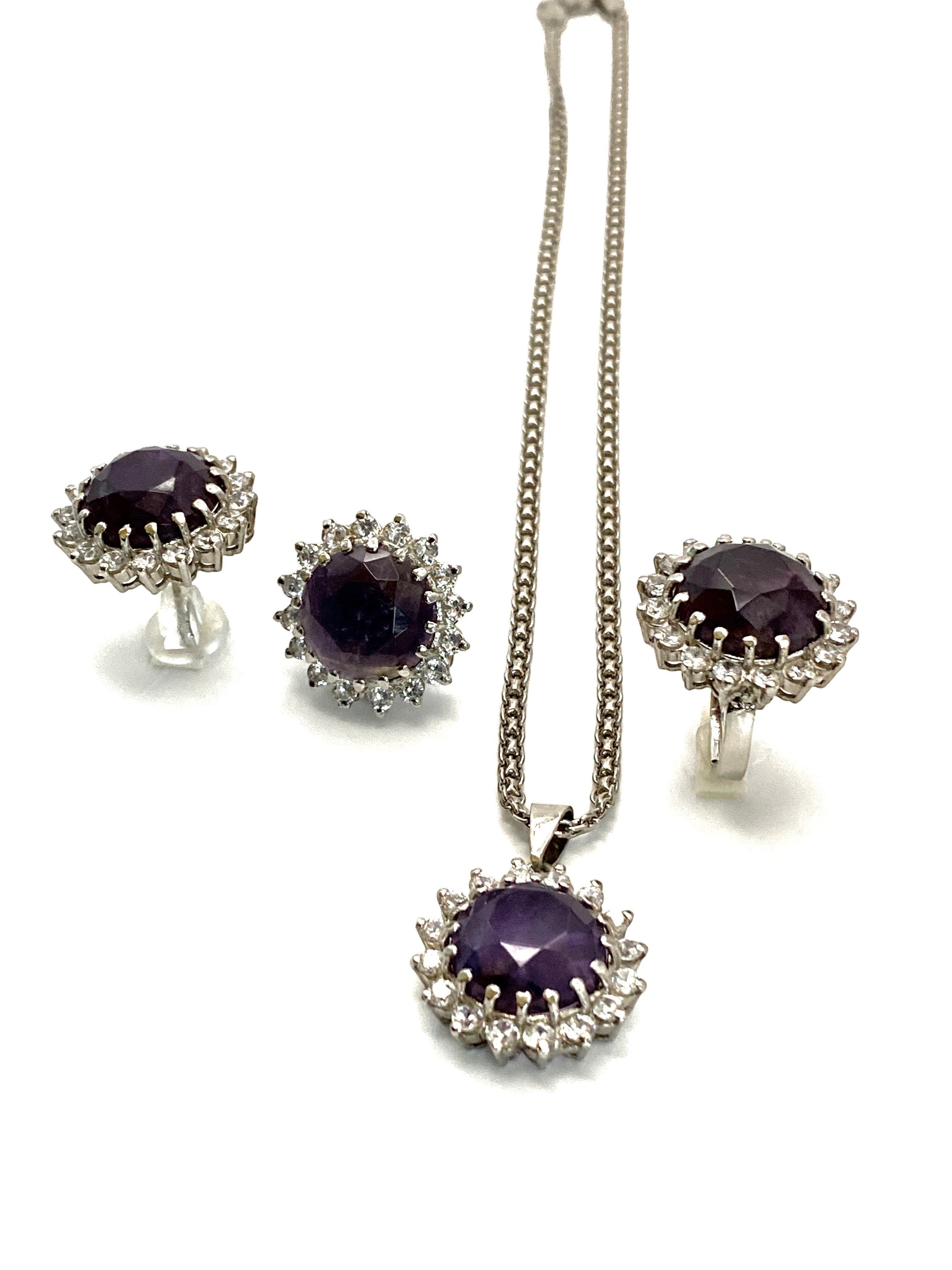 Niz & Aly Amethyst Serenity Locket Set featuring a necklace, earrings, and ring with purple stones and crystal halos.