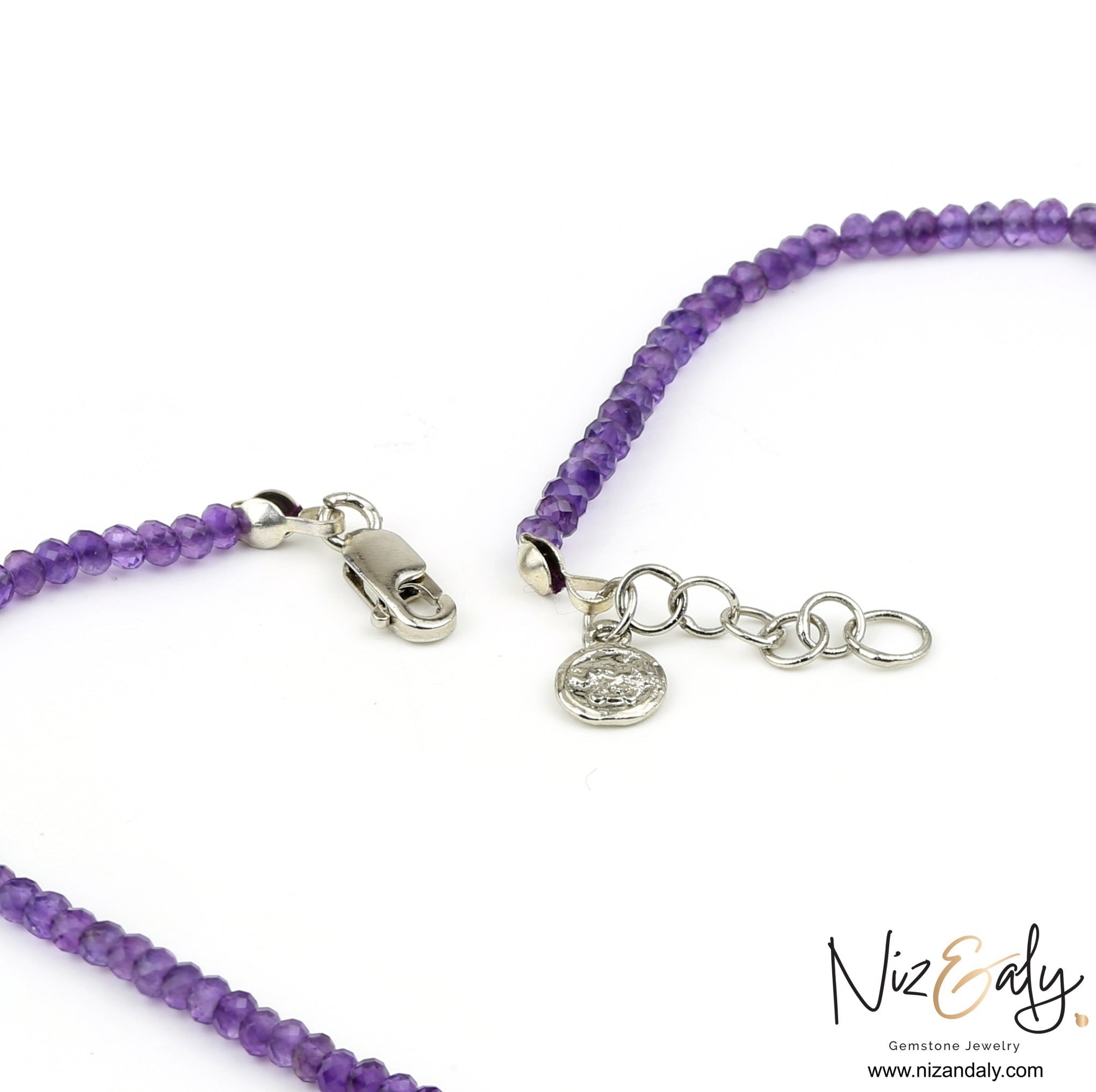 Niz & Aly Celestial Dew amethyst necklace showing the sterling silver lobster clasp and adjustable extender chain.