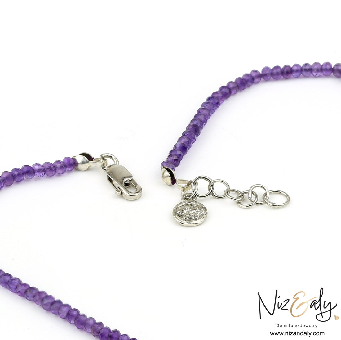 Niz & Aly Celestial Dew amethyst necklace showing the sterling silver lobster clasp and adjustable extender chain.