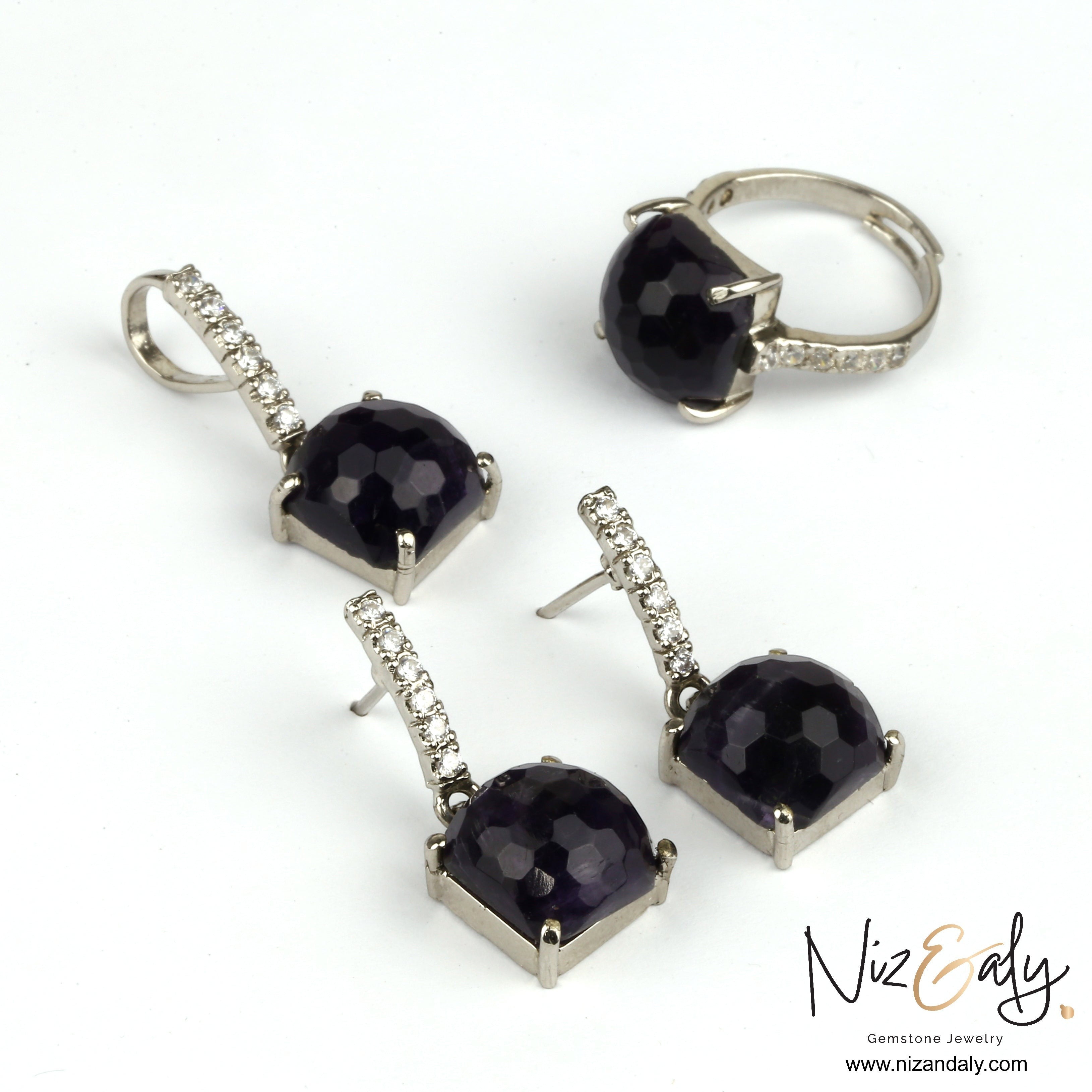 Niz & Aly dark amethyst pendant set with square faceted stones and diamond accents in a silver-tone setting