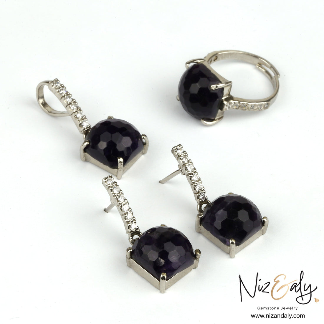 Niz & Aly dark amethyst pendant set with square faceted stones and diamond accents in a silver-tone setting