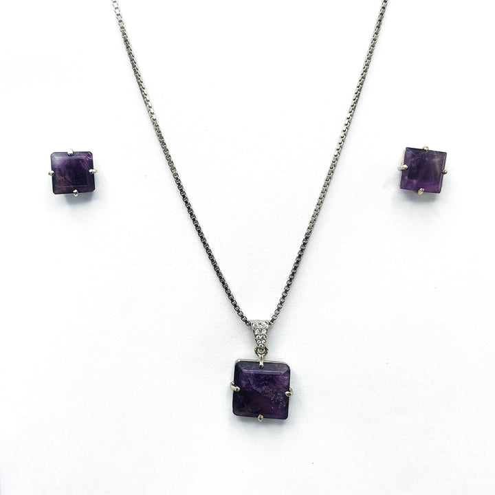 Niz & Aly square amethyst locket necklace and matching stud earrings set in silver on a white background
