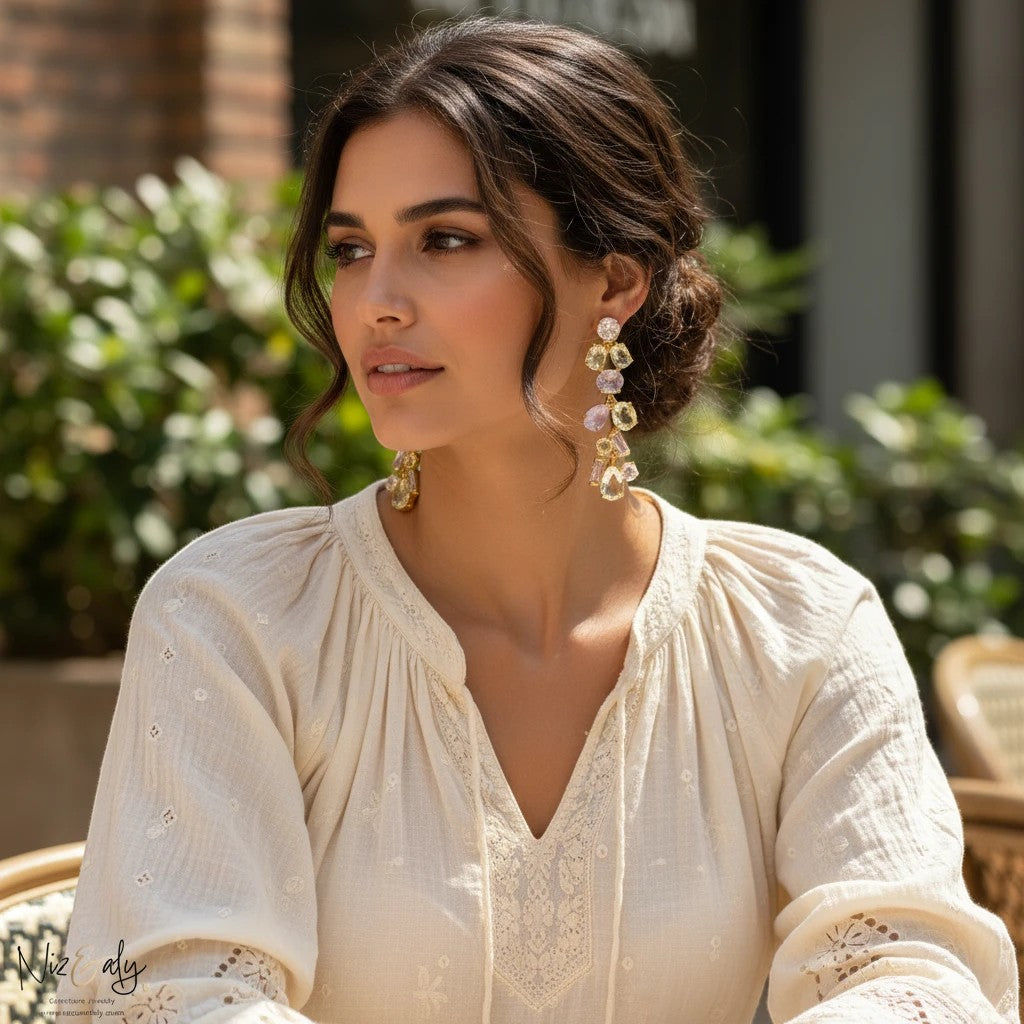 Niz & Aly cocktail dangle earrings featuring natural ametrine and citrine gemstones worn by a woman in a white blouse.