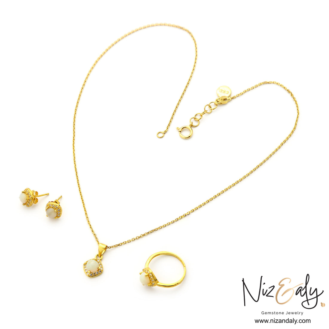 Niz & Aly Opaline gold-plated sterling silver jewelry set with white Australian opal pendant, ring, and stud earrings.
