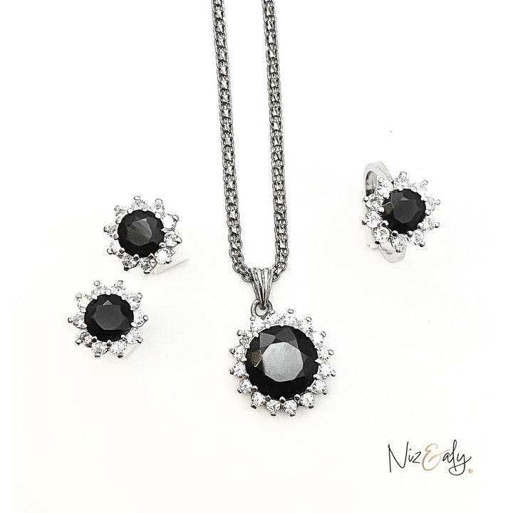 Niz & Aly Timeless Black Onyx Set featuring a pendant necklace and matching earrings with polished black gemstones.