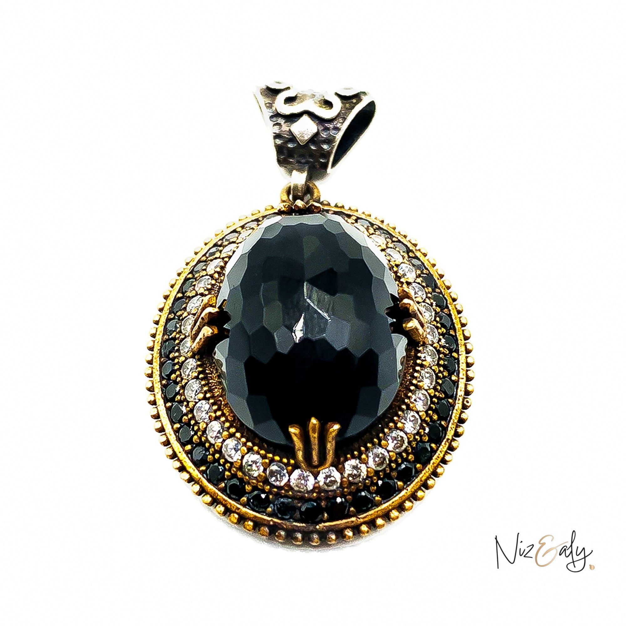 Niz & Aly faceted black onyx pendant with VVS cubic zirconia and tiny onyx accents in an intricate gold-tone setting