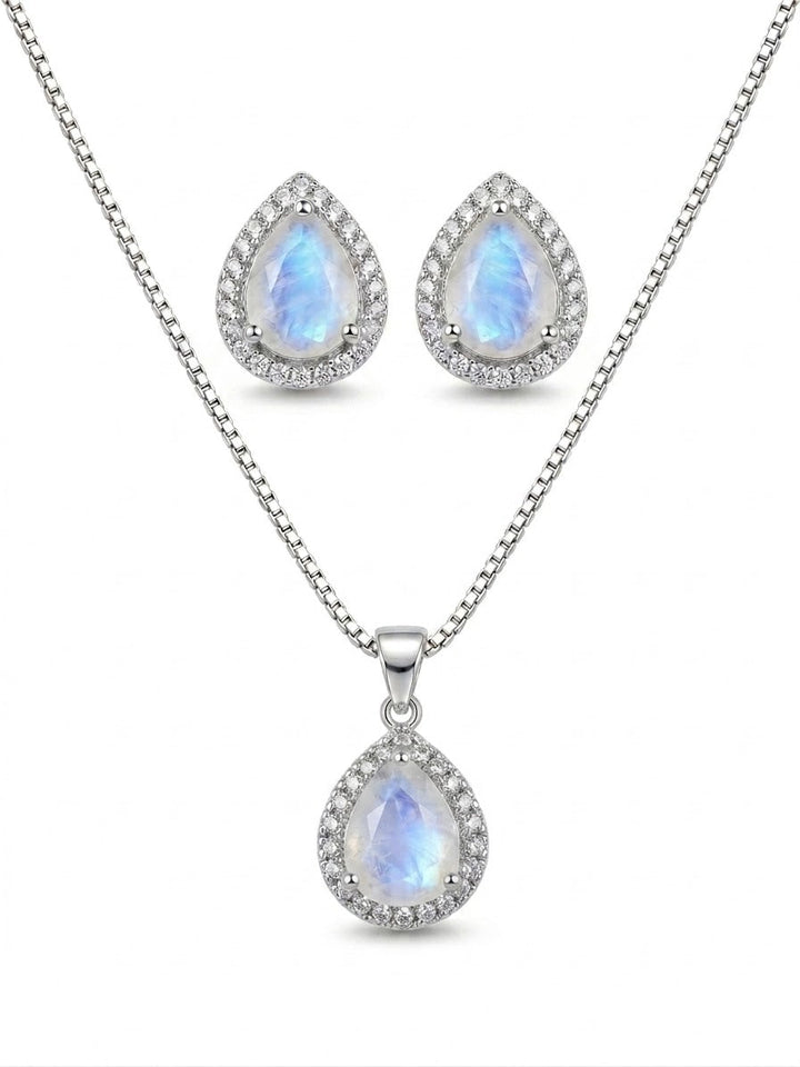 Niz & Aly blue flash moonstone pendant and earring set with diamond halo in sterling silver