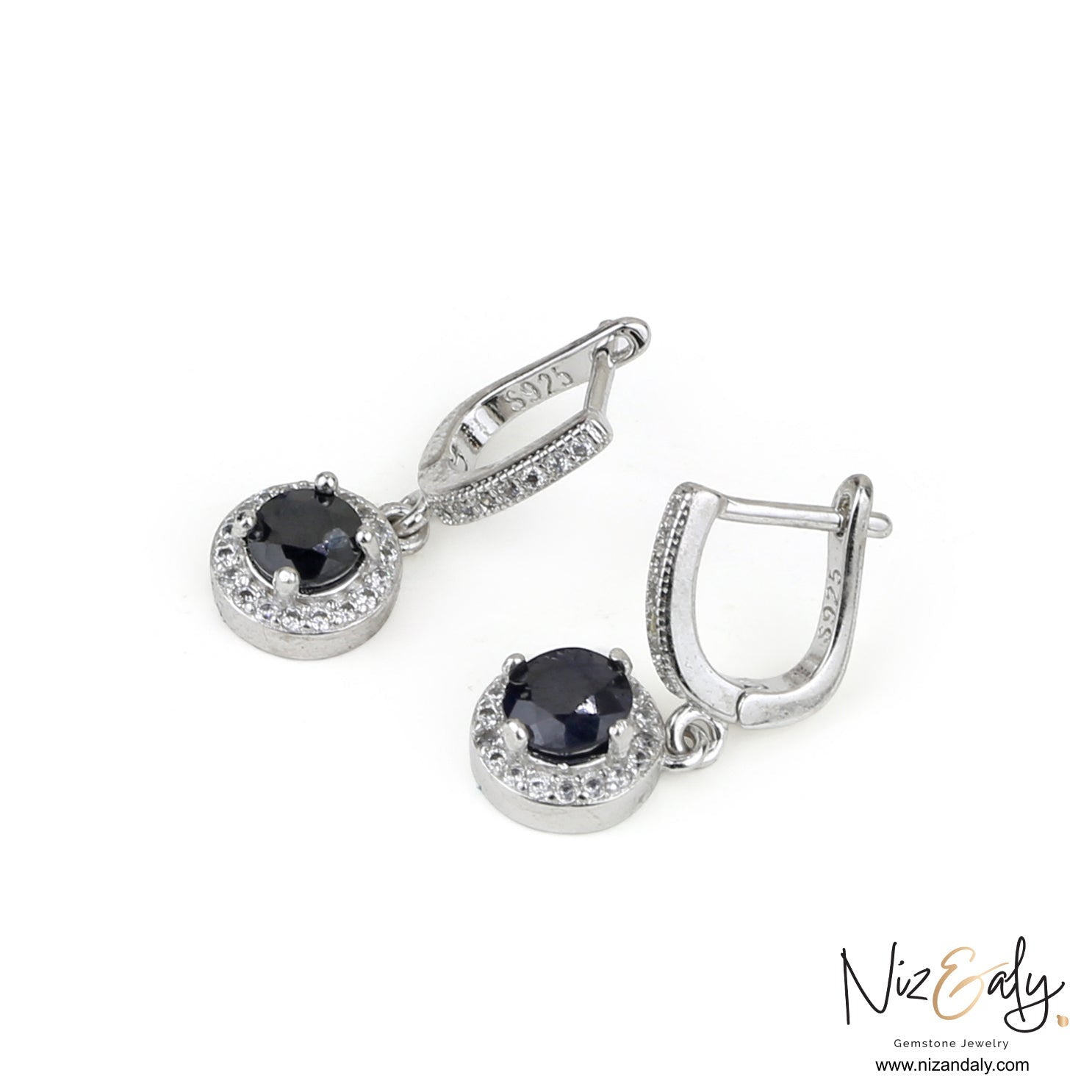 Niz & Aly blue sapphire and sterling silver drop earrings with halo white accents on a white background