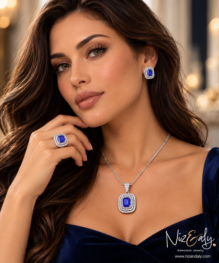 Niz & Aly lavender blue tanzanite jewelry set with halo pendant, earrings, and ring in sterling silver on a model