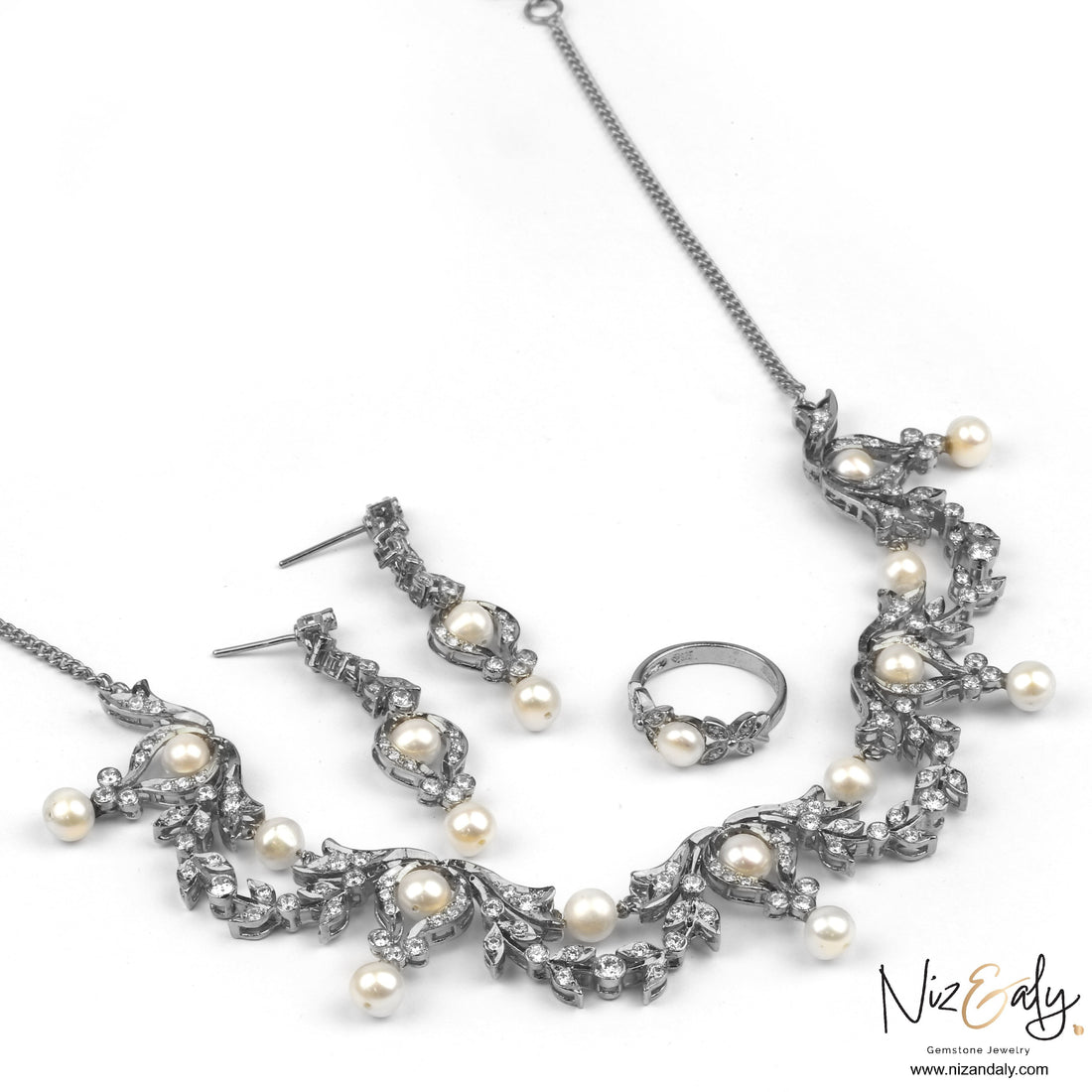 Niz & Aly bridal jewelry set featuring freshwater pearls and sparkling crystals set in sterling silver