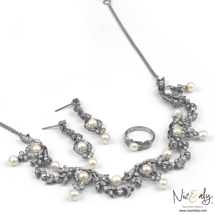 Niz & Aly bridal jewelry set featuring freshwater pearls and sparkling crystals set in sterling silver