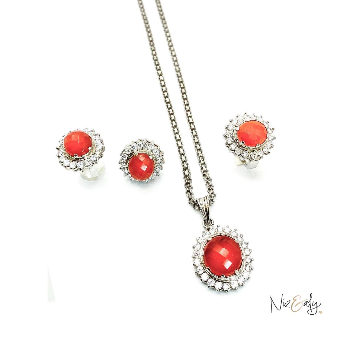 Niz & Aly Radiant Carnelian Locket Set featuring a faceted orange-red carnelian pendant and matching stud earrings.