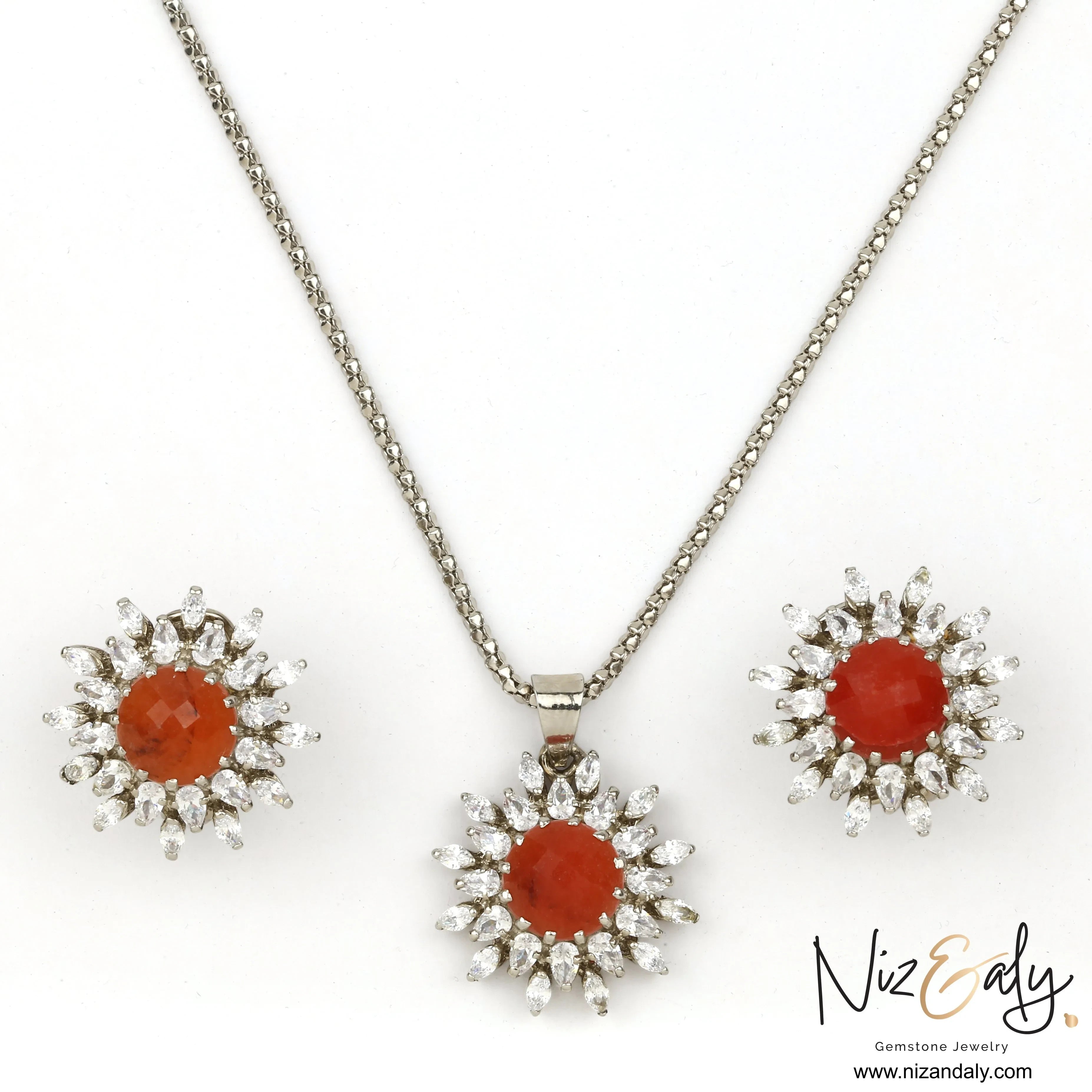 Niz & Aly faceted carnelian and clear quartz pendant and earring set with silver-tone floral halo design