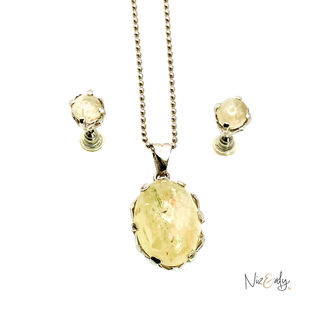 Niz & Aly natural untreated citrine locket pendant on a silver chain with matching stud earrings