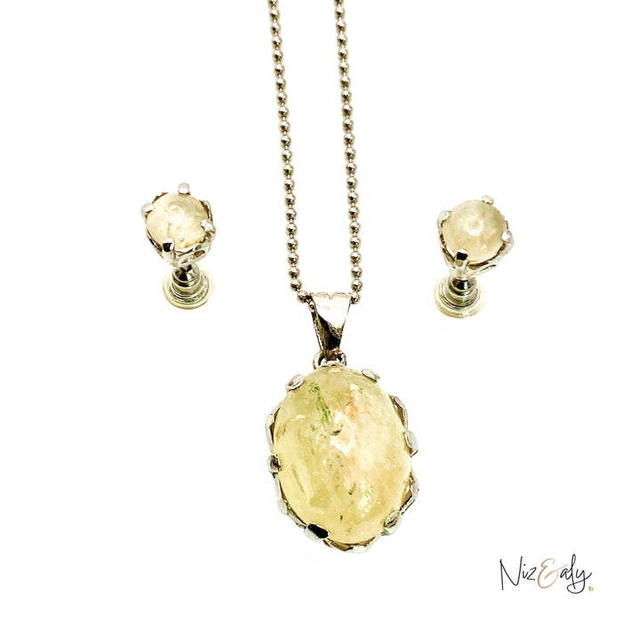Niz & Aly natural untreated citrine locket pendant on a silver chain with matching stud earrings