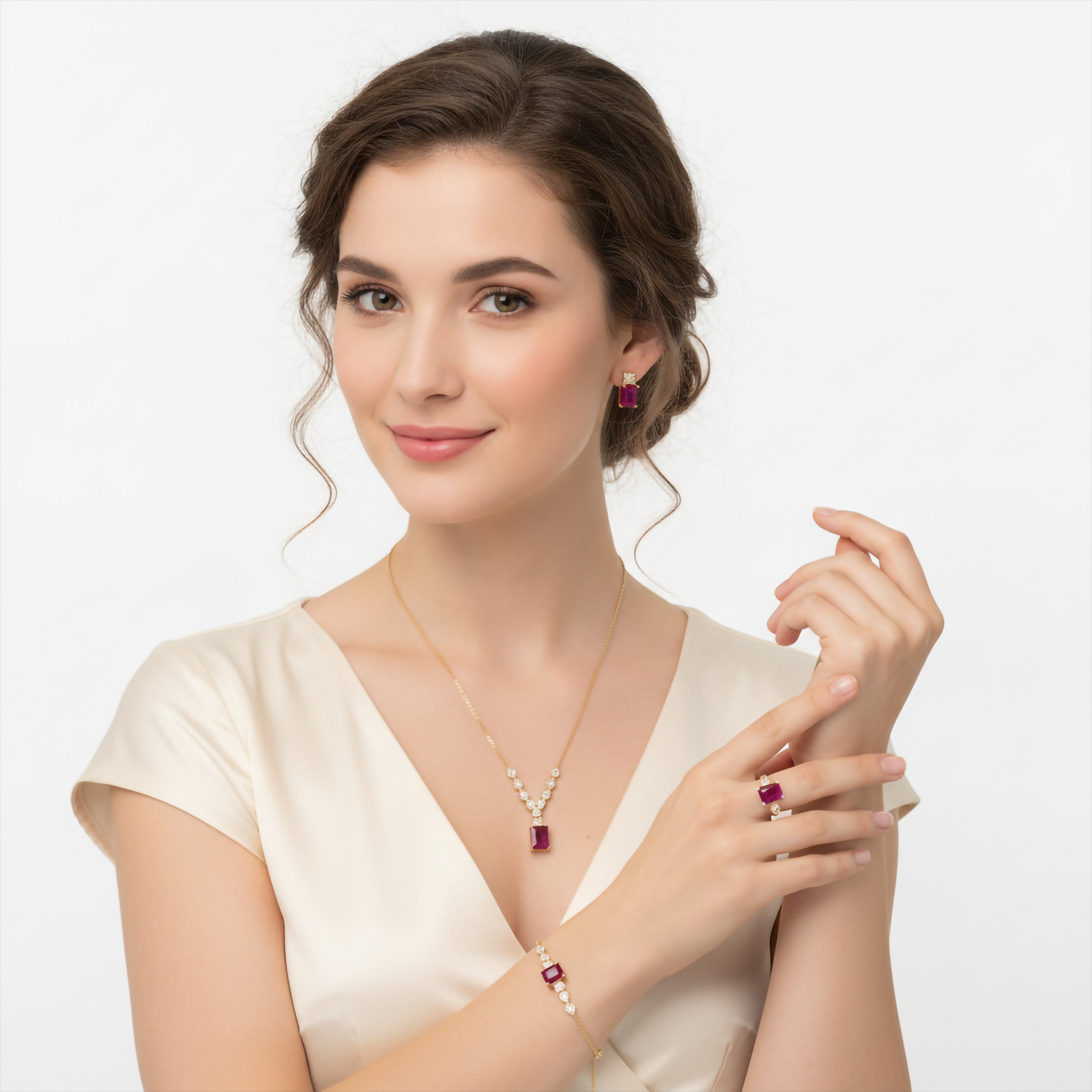 Niz & Aly composite ruby jewelry set featuring a pendant, earrings, bracelet, and ring on a smiling woman.