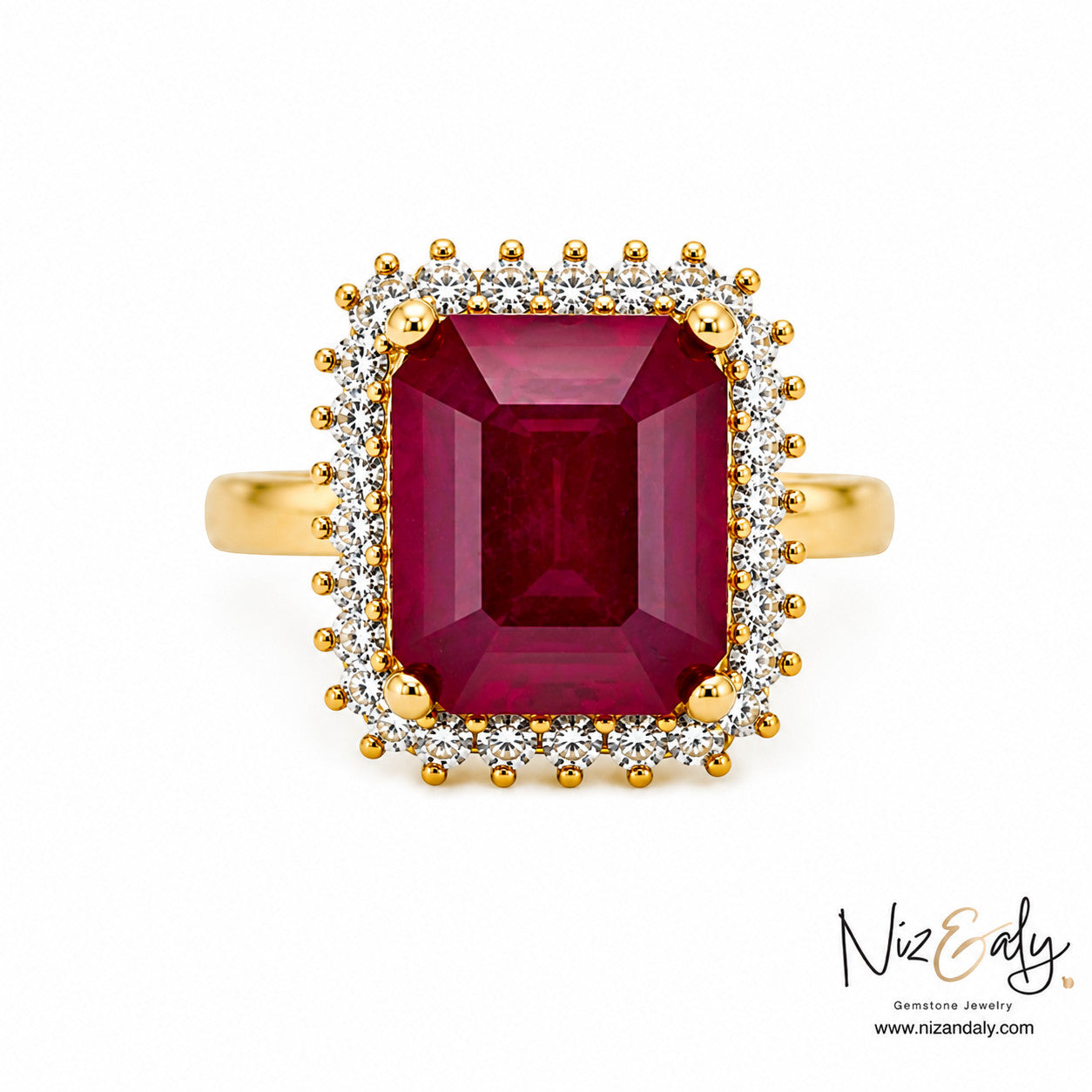 Niz & Aly emerald-cut natural ruby ring with a diamond halo set in polished yellow gold.
