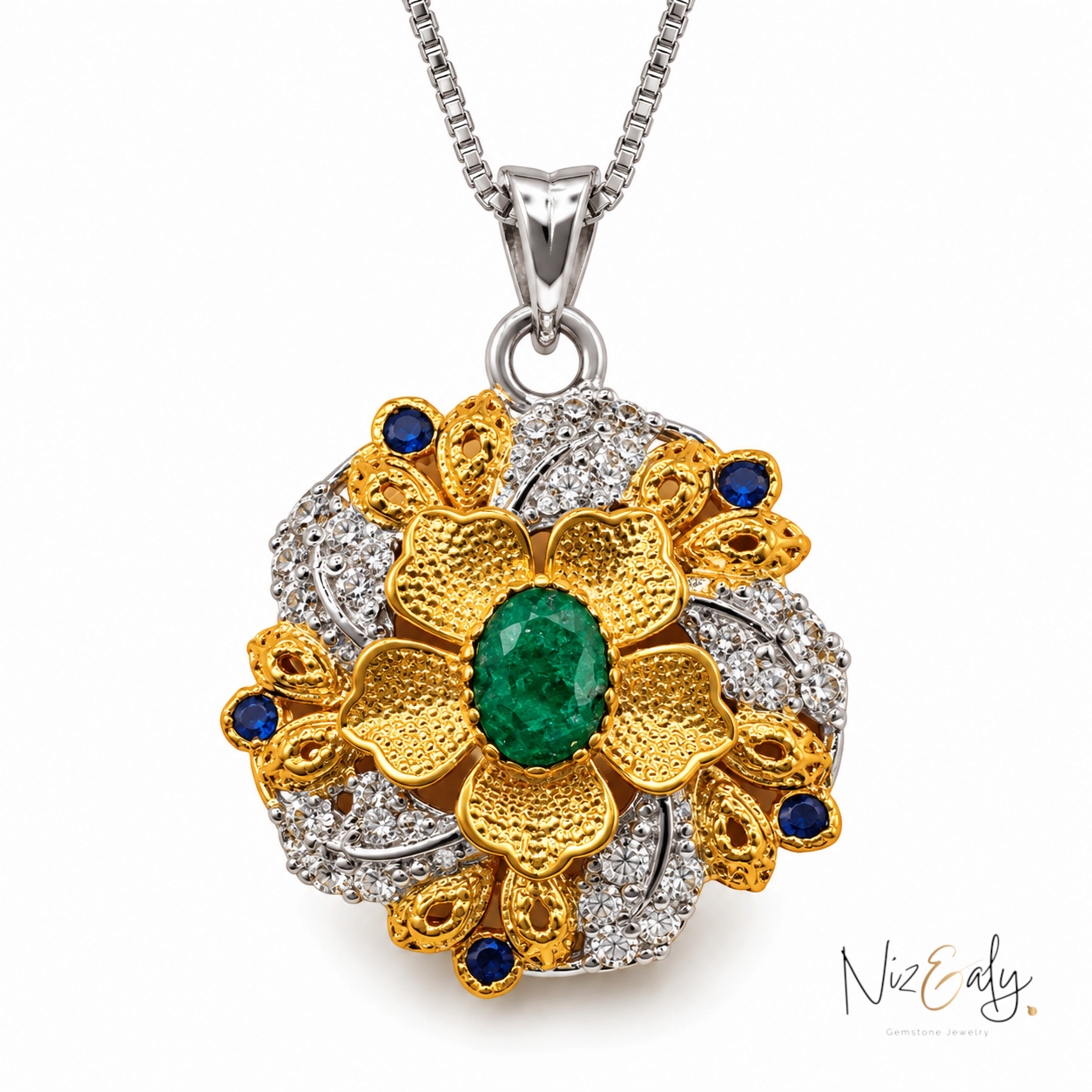 Niz & Aly floral pendant necklace featuring a central emerald in a bezel setting with gold petals and diamond accents.
