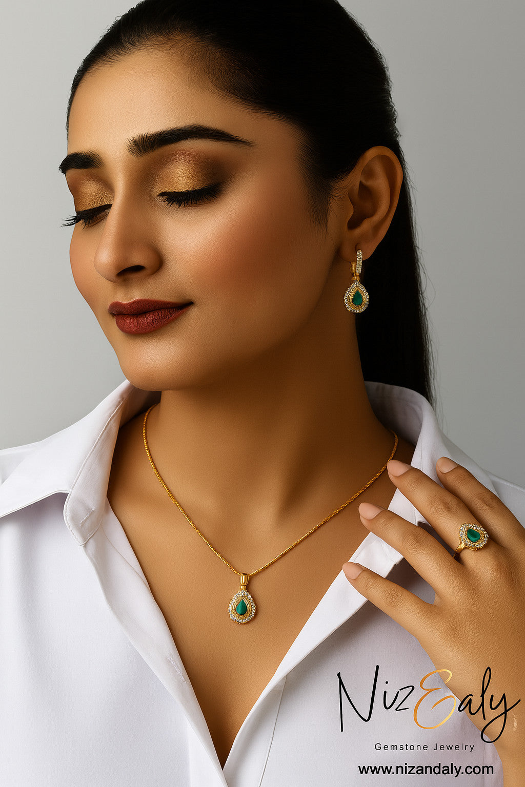 Niz & Aly Emerald Reverie teardrop pendant, earrings, and ring set in gold-plated sterling silver with halo stones.