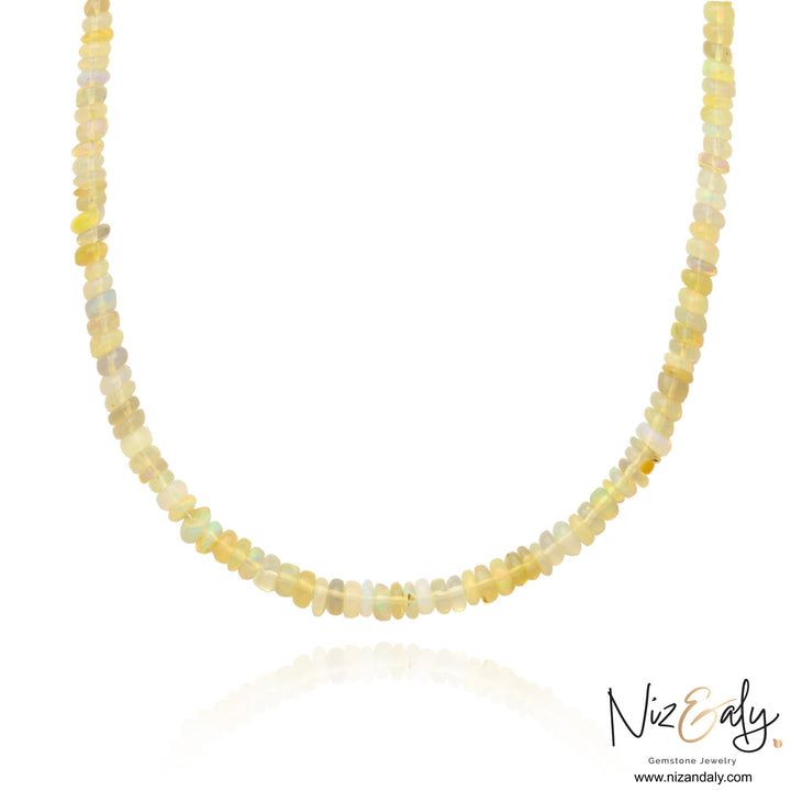 Niz & Aly 18-inch necklace featuring natural Ethiopian fire opal rondelle beads with vibrant rainbow flashes.