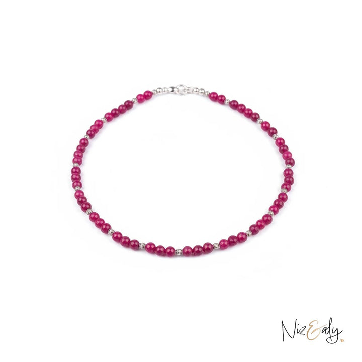 Niz & Aly genuine almandine garnet necklace featuring faceted 6mm deep red gemstone beads with silver accents.