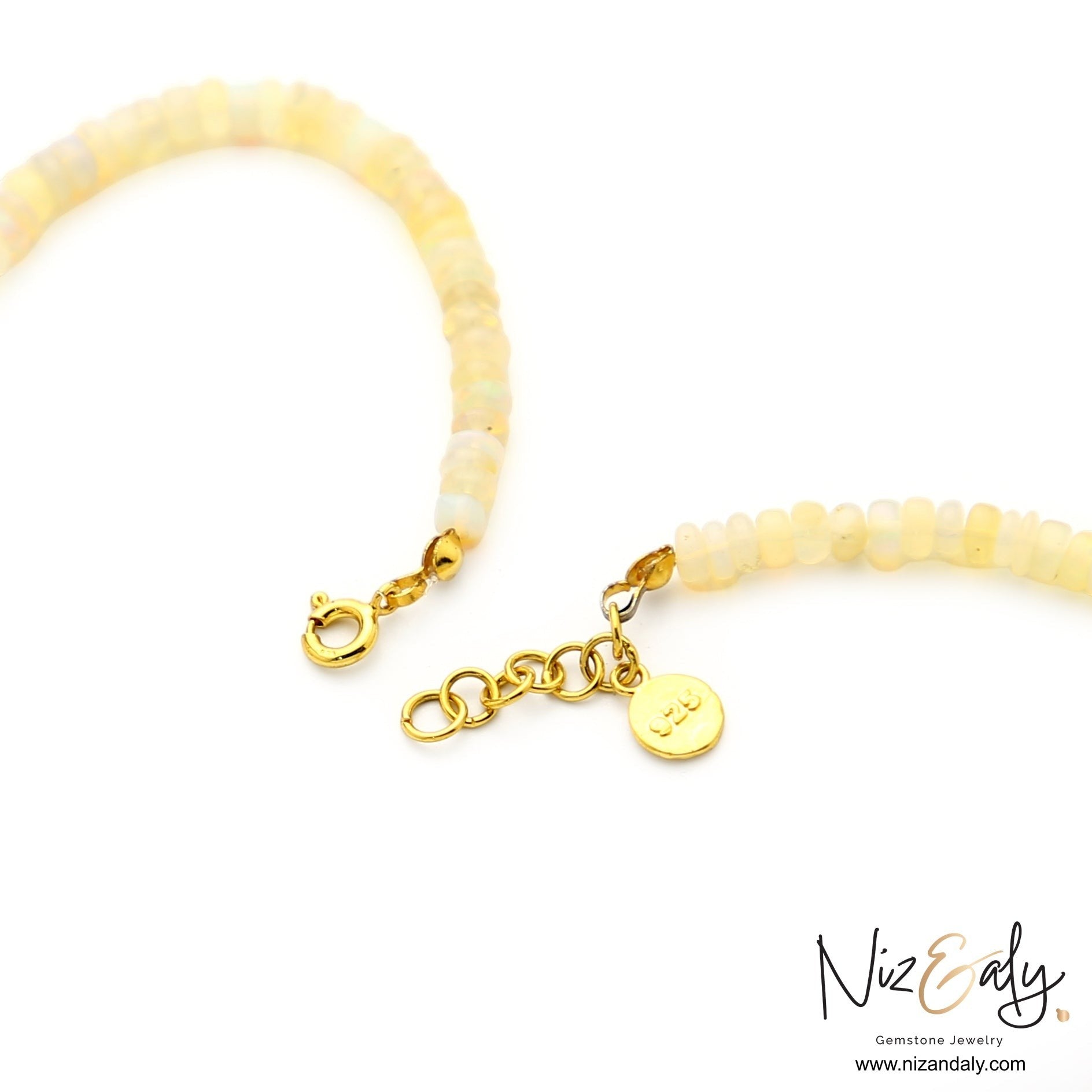 Niz & Aly fire opal beaded necklace with gold clasp and 925 sterling silver tag on white background