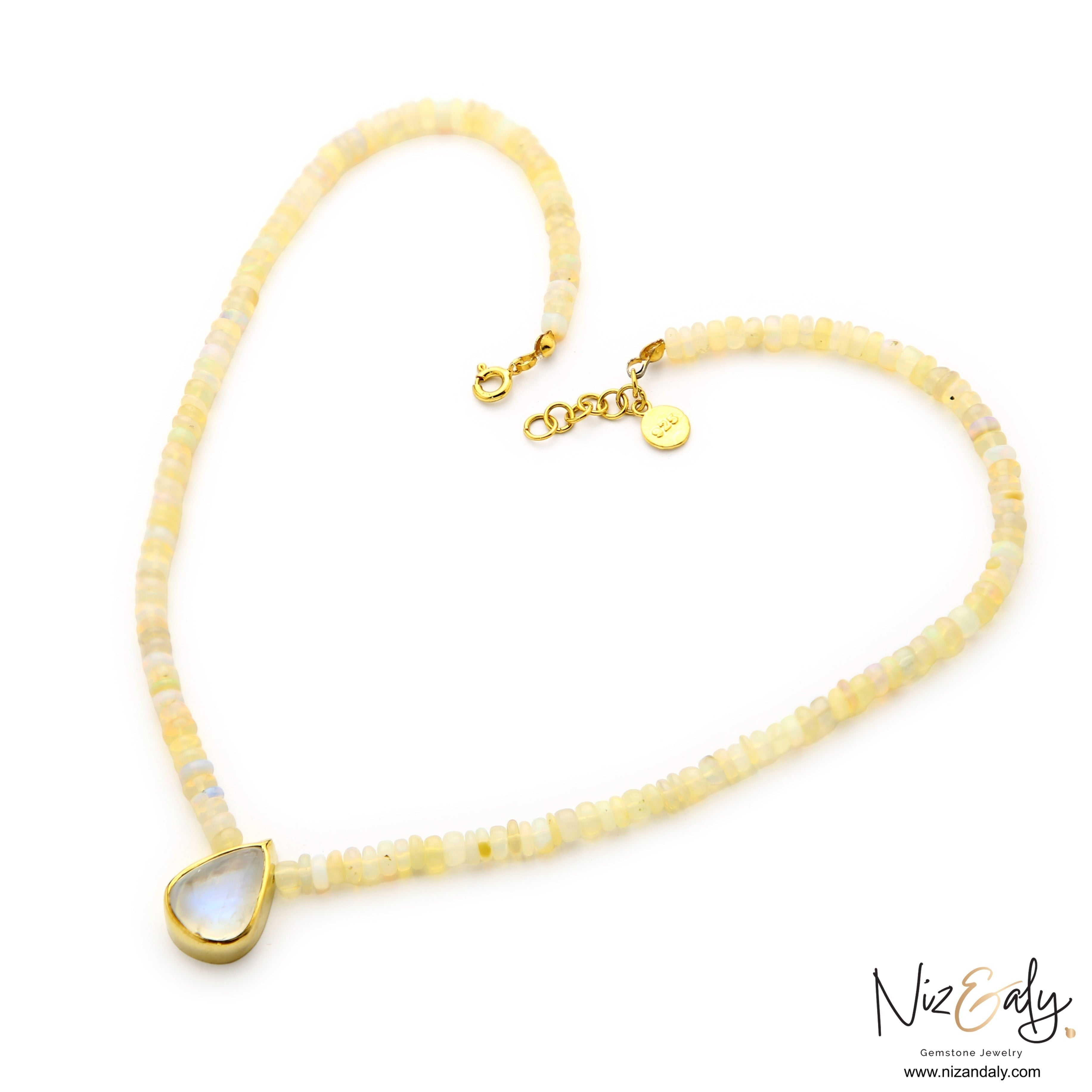 Niz & Aly handcrafted necklace featuring Ethiopian fire opal beads and a teardrop rainbow moonstone pendant in gold.