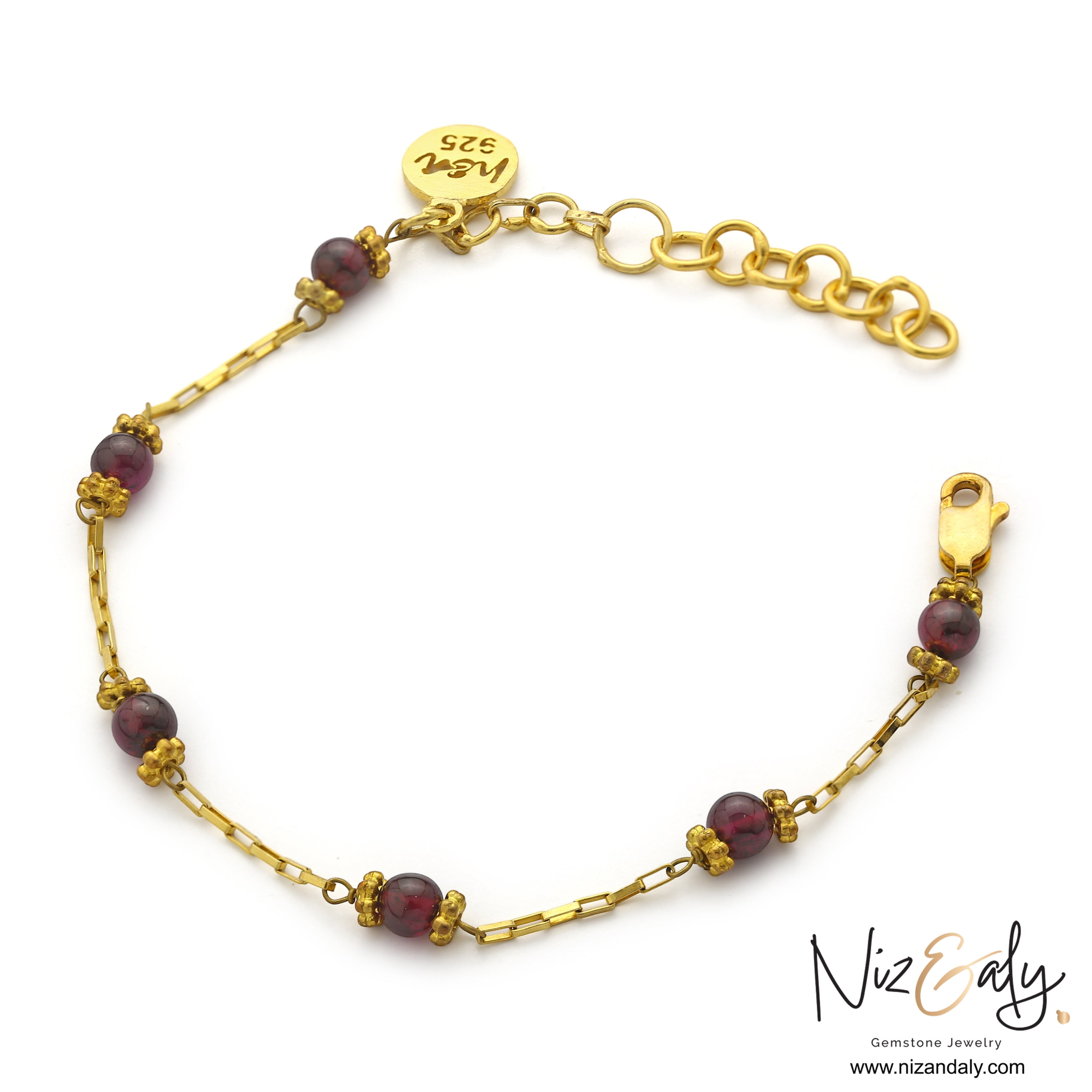 Niz & Aly dainty gold chain bracelet featuring natural burgundy pyrope garnet beads and a branded charm.