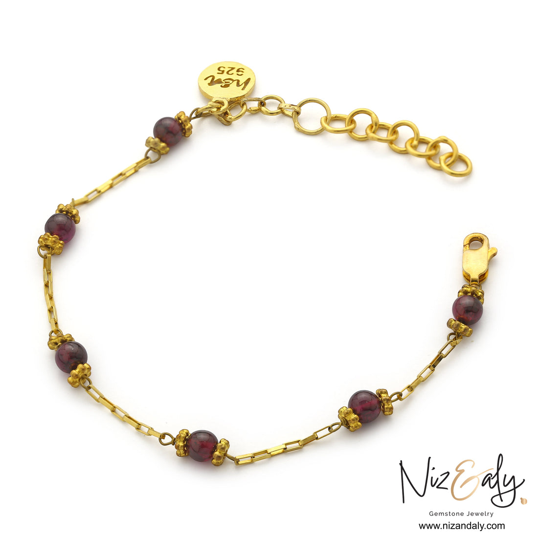 Niz & Aly dainty gold chain bracelet featuring natural burgundy pyrope garnet beads and a branded charm.