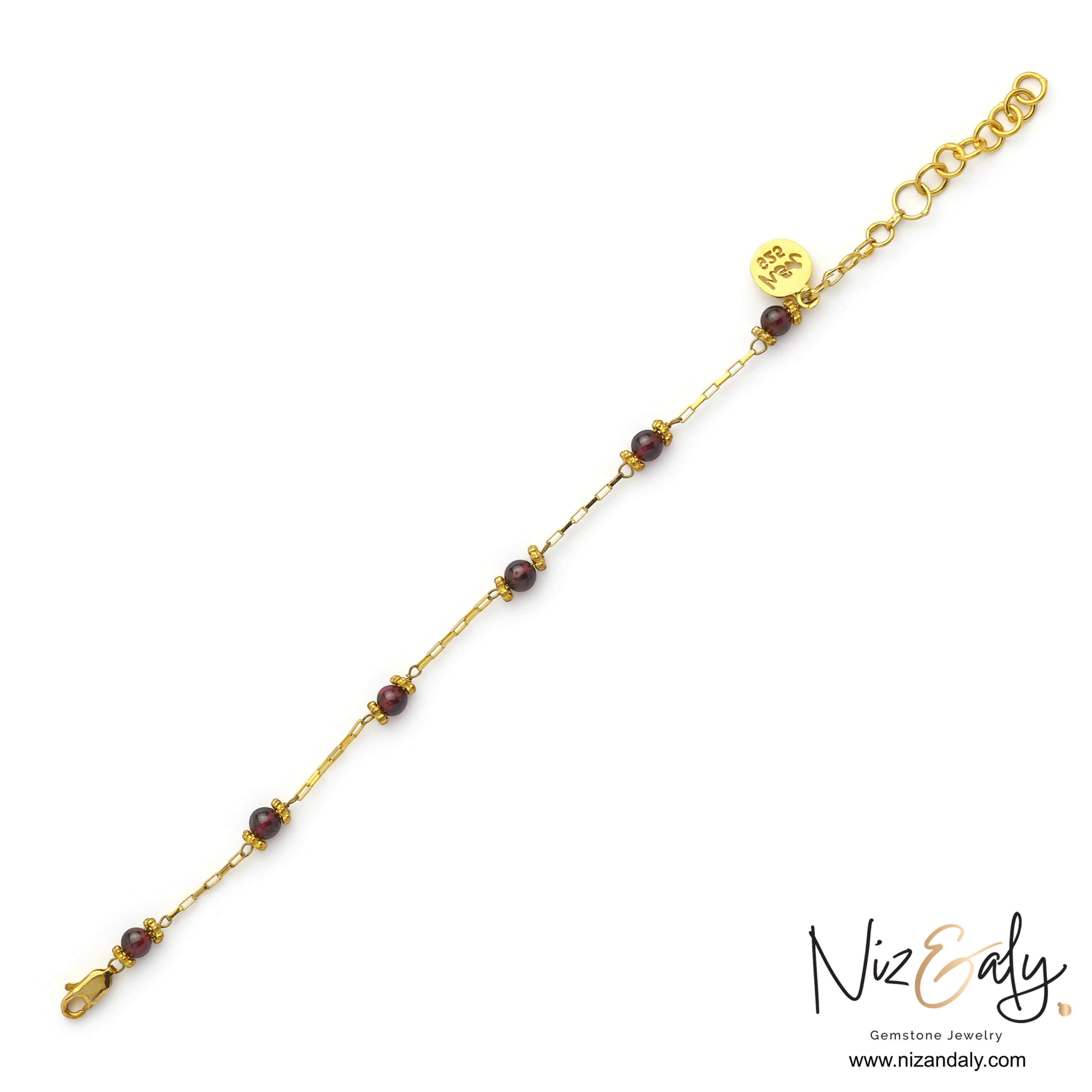 Niz & Aly dainty gold chain bracelet featuring natural burgundy pyrope garnet beads and a delicate clasp