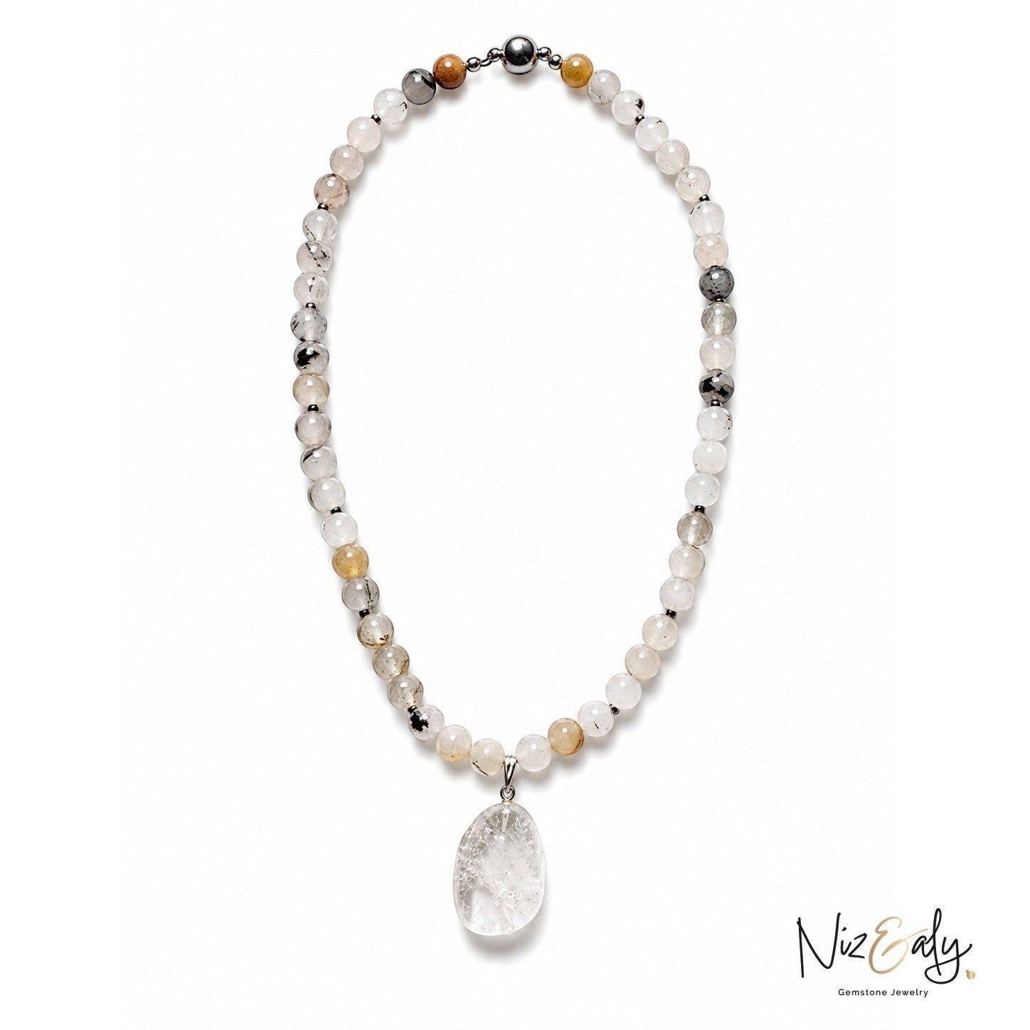 Niz & Aly necklace featuring natural semi-precious gemstone beads in neutral tones with a clear crystal pendant