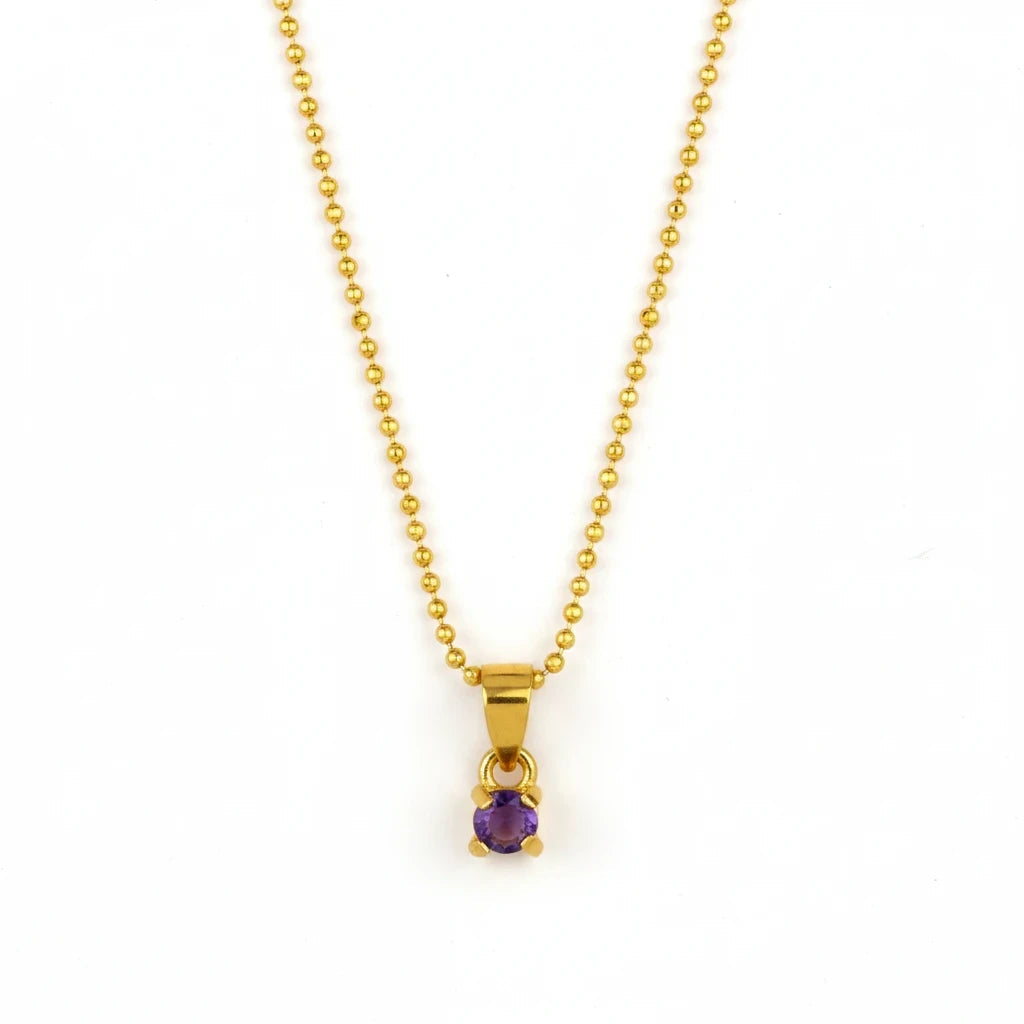 Niz & Aly dainty gold-plated necklace featuring a small, faceted purple amethyst pendant on a delicate ball chain.