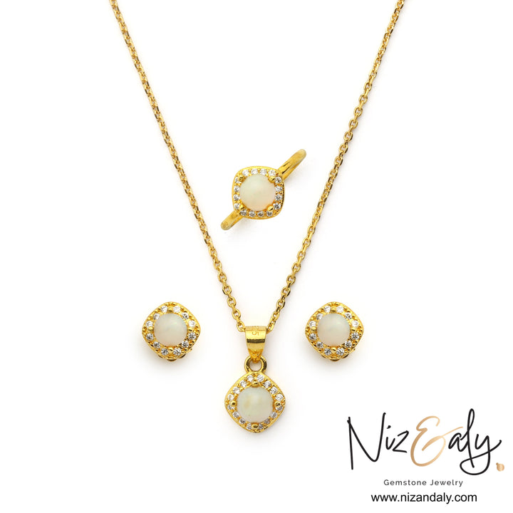 Niz & Aly gold-plated sterling silver jewelry set with natural white Australian opals, square halos, and clear stones.