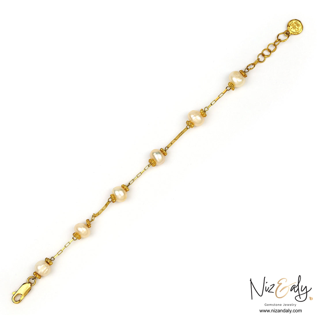Niz & Aly gold-plated 925 sterling silver bracelet featuring luminous 7mm white freshwater pearls on a delicate chain.