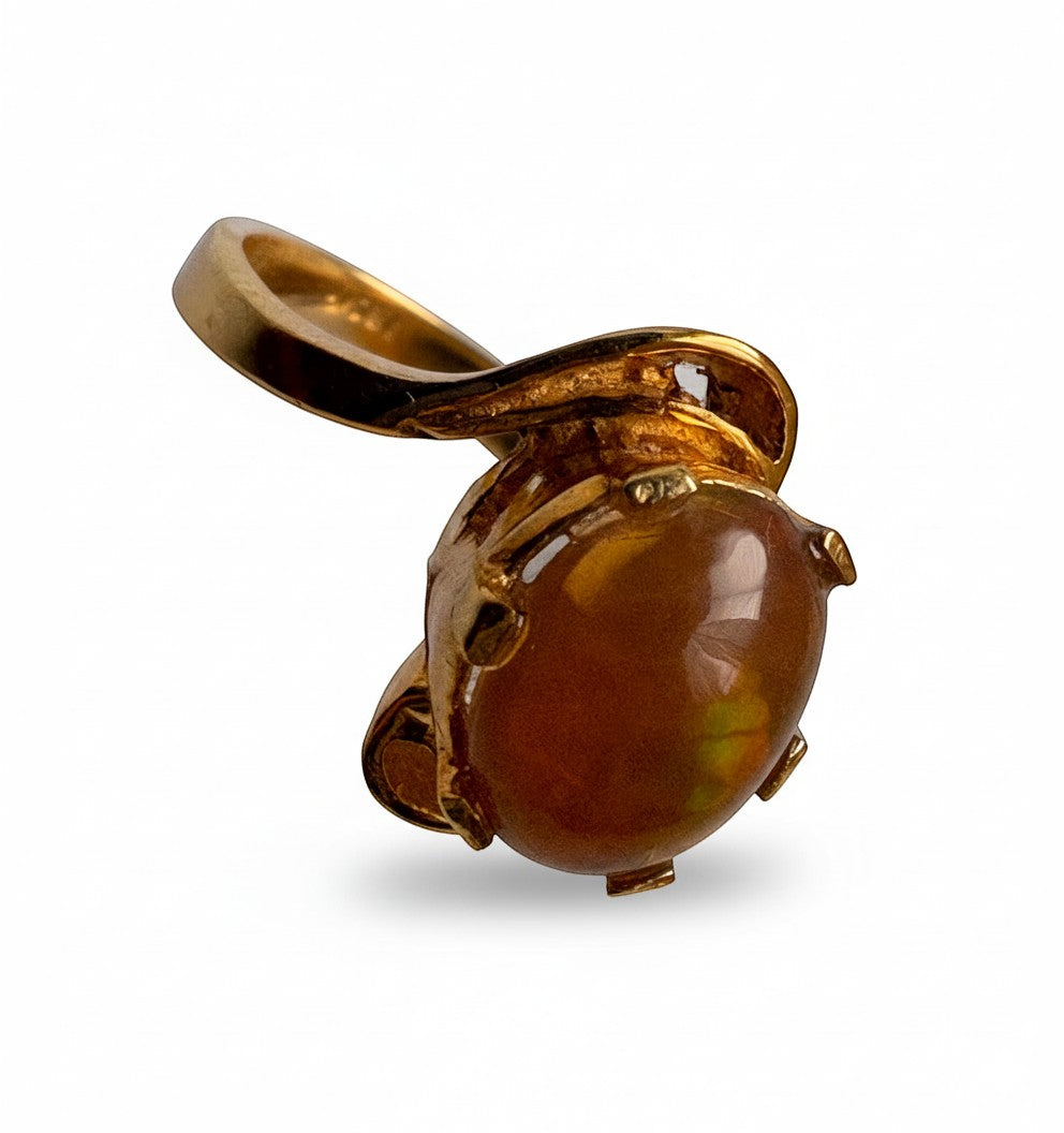 Niz & Aly adjustable ring featuring a golden fire opal set in gold-plated sterling silver with a prong setting.