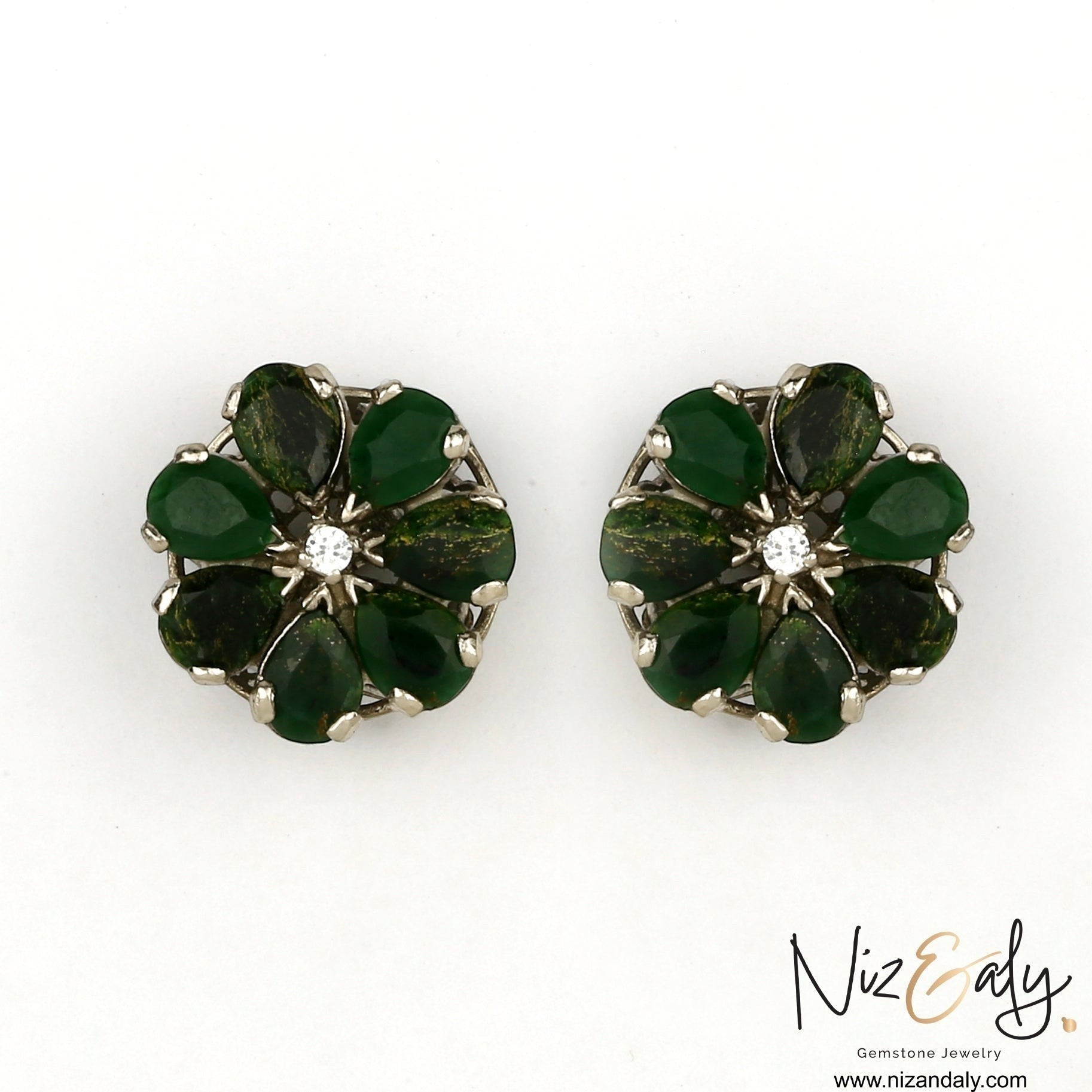 Niz & Aly green chrysoprase flower ear studs with teardrop gemstones and a central white stone in a silver setting.