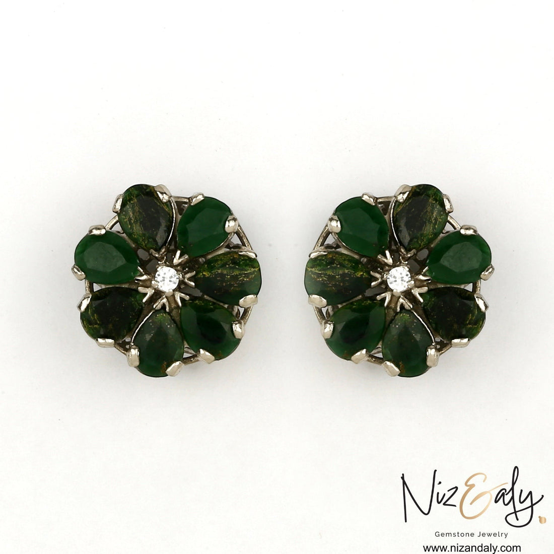 Niz & Aly green chrysoprase flower ear studs with teardrop gemstones and a central white stone in a silver setting.