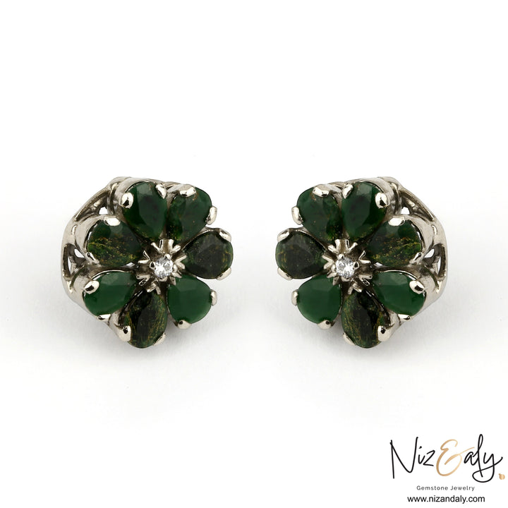 Niz & Aly green chrysoprase flower-shaped ear studs with a central sparkling stone in a refined silver setting.